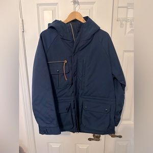 New Woolrich quilt lined fall/winter jacket. Made in USA. Size L.